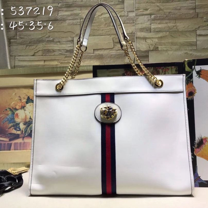 G*u*i shopping bags
